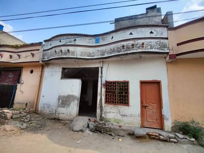 2.75 Marla single storey house Available for Sale in masroof town 20 feet Gali me