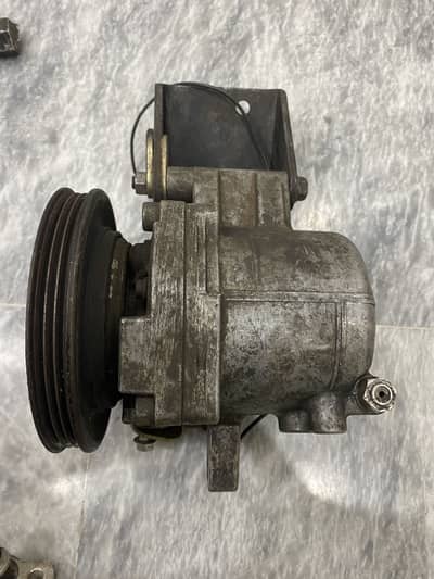 Ac compressor and ac pipe