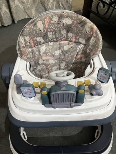 Baby walker with music system for sale 10/10 condition