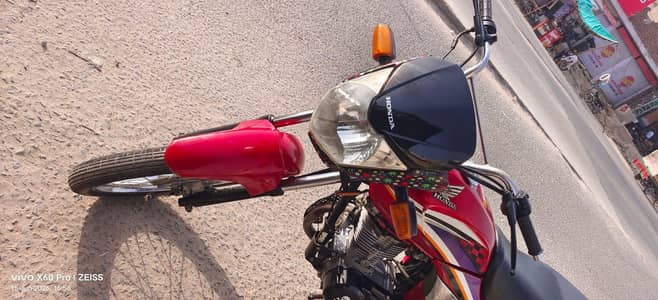 Honda 125 Delux Multan number 0-3-0-9*61-51-9-7-7