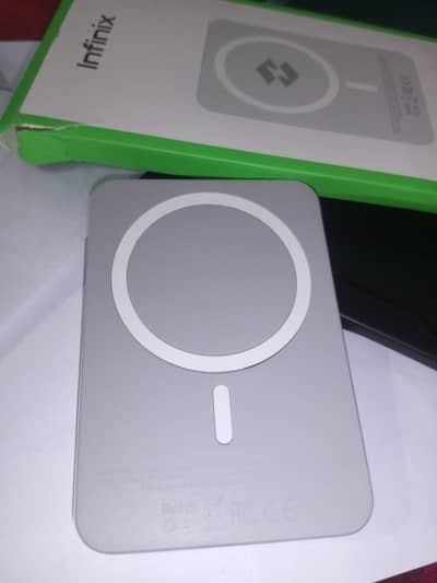 Infinix mega power wireless charger + portable battery