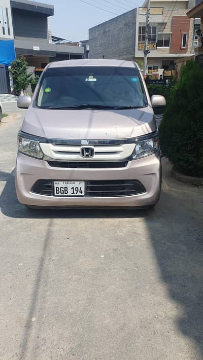 Honda n wgn for sale 2014 model 2018 import  neat and clean car