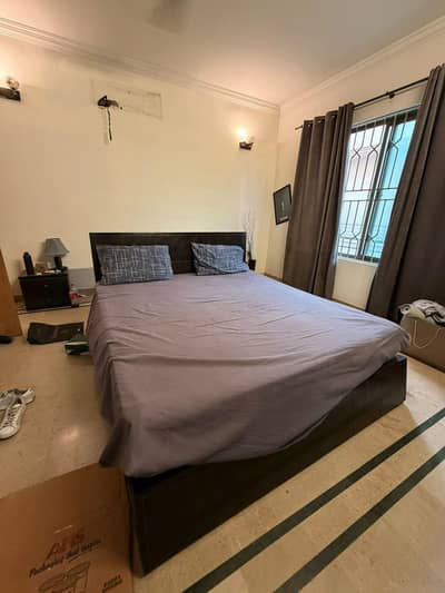 Bed set with mattress, side table, and dressing table