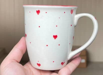 white with red hearts mug