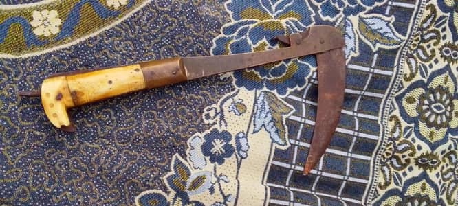 old antique pis khanger