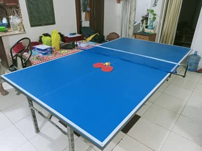 Table Tennis table with net, rackets etc