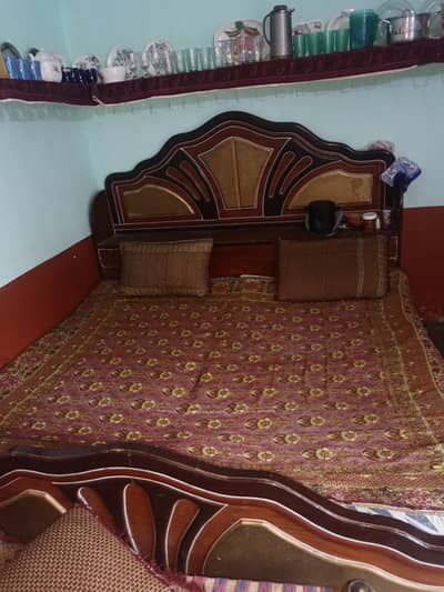 wooden double bed