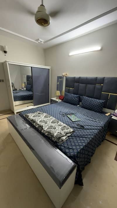 King Size bed with side table, sethi and almari.