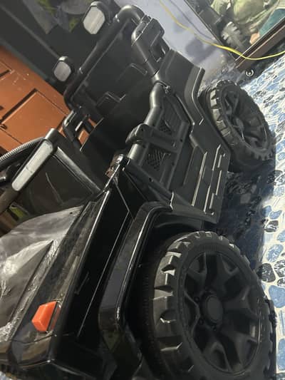 Kids jeep , double battery, lights , usb , music ,remote control