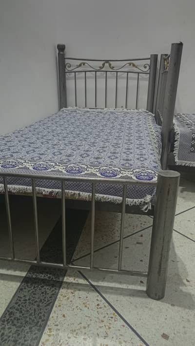 Two iron beds 15000 each