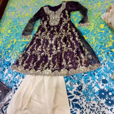 1 Time used  short paplum wd grara in plum  & golden clr