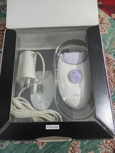 Braun hair applicator machine
