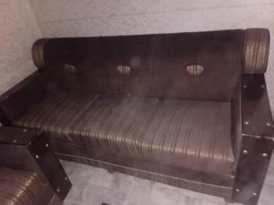 3 seater sofa in brown colour 