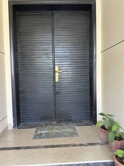 Main wooden double door