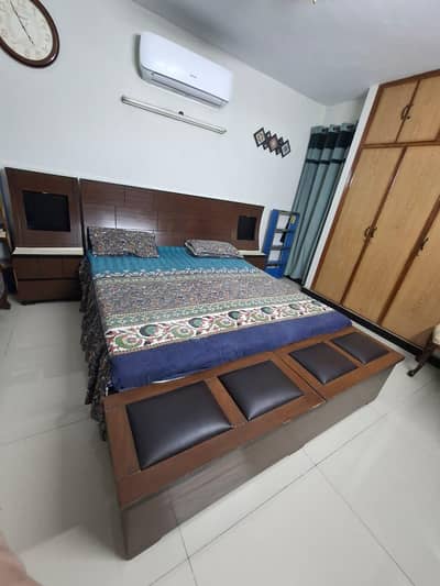 Double Bed with Dressing table and two side tables.