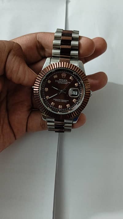 Rolex day just rose gold tone with sapphire glass
