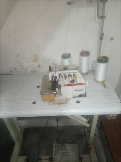Overlock Machine 747 with servo motor ok condition ma ha