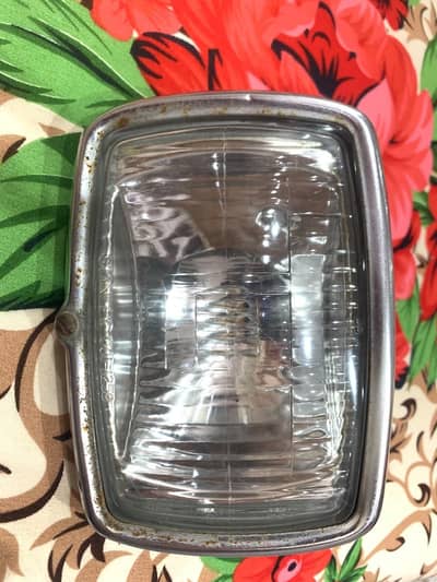 Honda 125 2001 model geniune glass headlight stanley