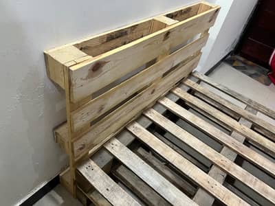 Single Bohemian Style Bed made of Wooden Pallets