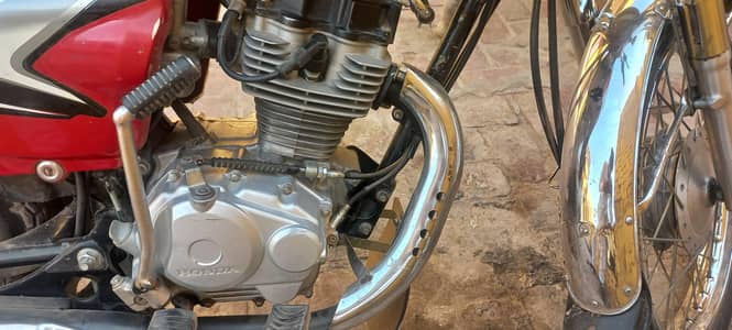 Honda 70 model 2026 red colour