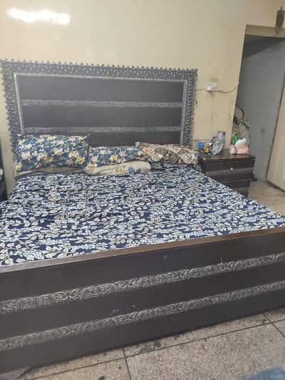 2 Bed king size wooden bed available without any table .
