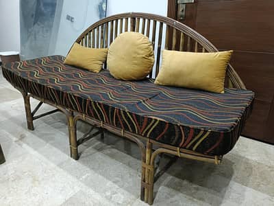 3 seater cane sofa
