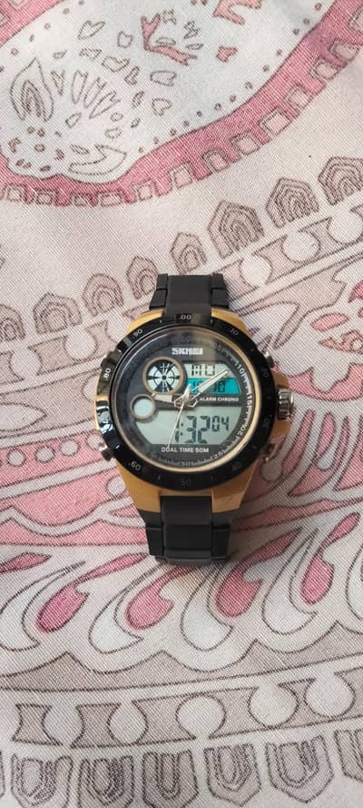skmei gold watch