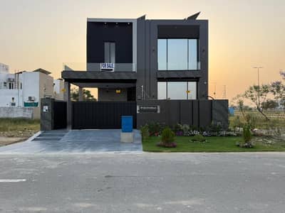 FULLY FURNISHED 10 MARLA ELEGANT SUPER HOT LOCATED BUNGALOW WITH 10KVA SOLAR INSTALLED IS AVAILABLE IN THE BEST BLOCK OF DHA LAHORE.