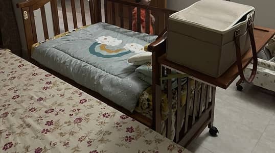 Wooden baby cot by tinnies