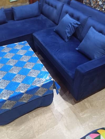 L shaped sofa and table for sale.