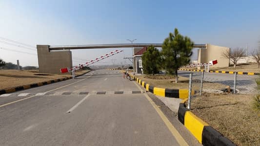Buy your ideal 5 Marla Residential Plot in a prime location of UpCountry Enclosures Housing Society