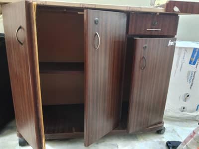 Iron stand with cabinets