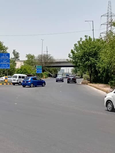 14.50 Kanal Commercial Plot Measuring Front 300ft depth 220ft, Available for Sale Located at Main Pine Avenue 150ft Road Lahore.