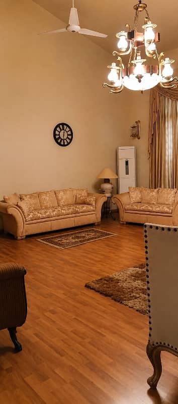 ARCHITECTURAL MASTERPIECE 1000 SQUARE YARD OWNER-BUILT NASEEM NAJMI BUNGALOW FOR SALE ON B STREET, DHA PHASE 5