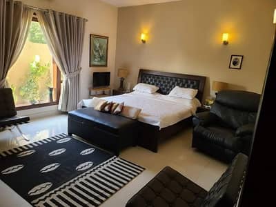 ULTRA-EXCLUSIVE FULLY FURNISHED LUXURY GROUND PORTION FOR RENT IN DHA PHASE 8 KARACHI