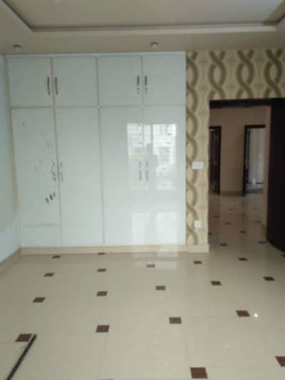 A PRIME LOCATION 12 MARLA HOUSE FOR SALE IN SHAHEEN BLOCK SECTOR B BAHRIA TOWN LAHORE