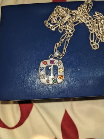 Navratra pendent (9 Stone pendent silver 92.5)