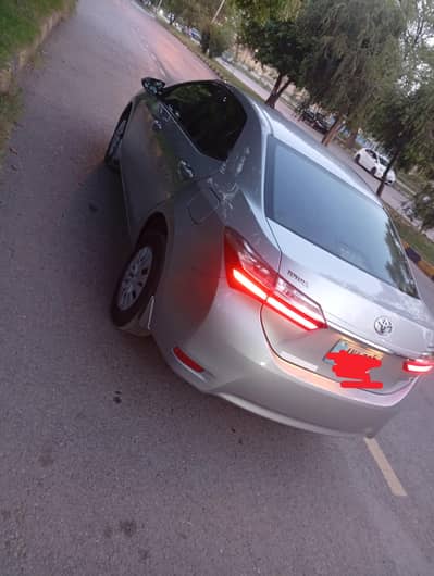 Toyota Corolla GLI Islamabad number  first owner my name