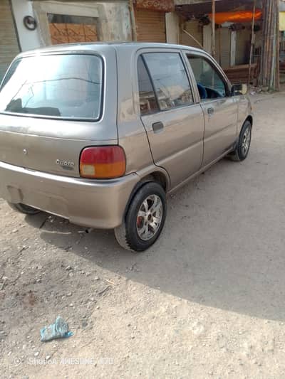 Daihatsu Cuore 2009 03122474166