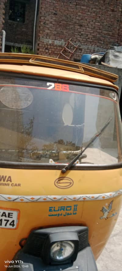 Shiva riksha color orange Lahore