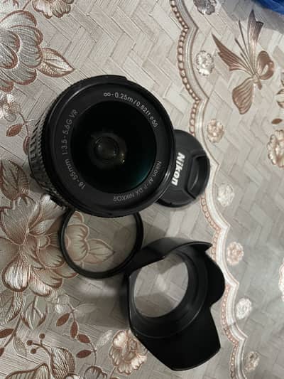 Nikon 18-55mm with hood and Uv filter