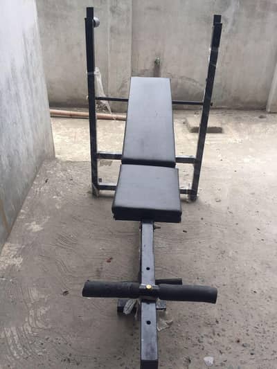 Banch press , Boxing Bag , rubber coated plates and solid iron rods