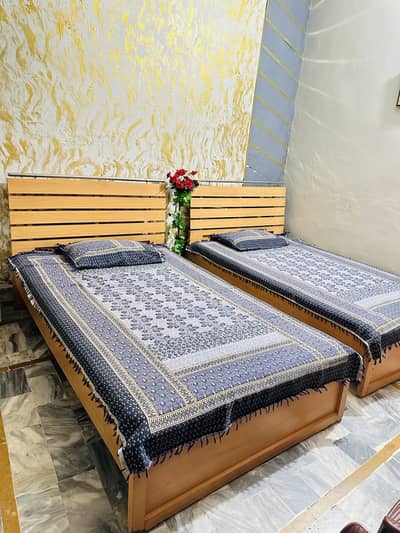 pair of single beds with Almari