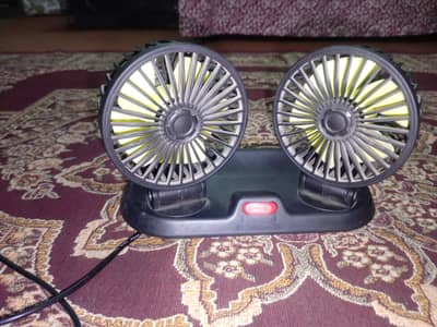 A Pair of Fans for Cars