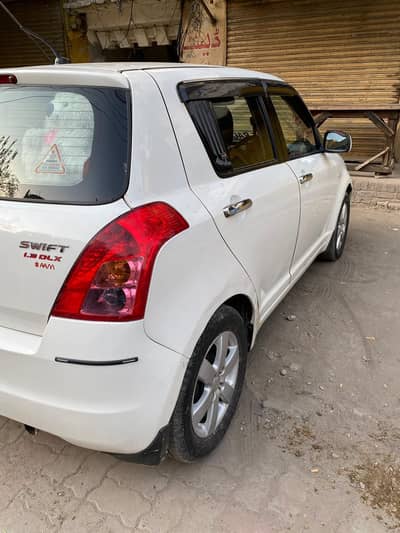 Suzuki Swift Dlx Total Original