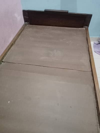 Single Wooden Bed in used and in good condition available for sale
