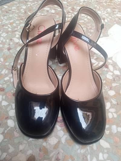 black Mary Jane or court shoes
