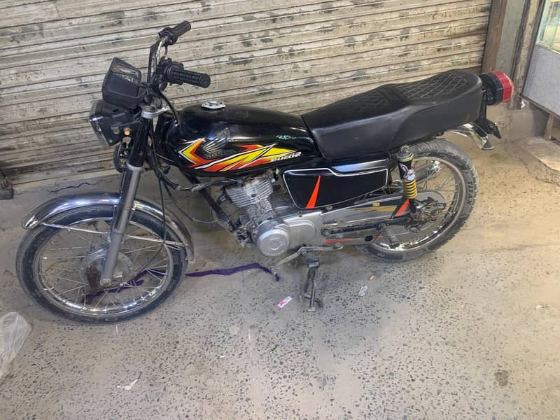 125 2003 model 6