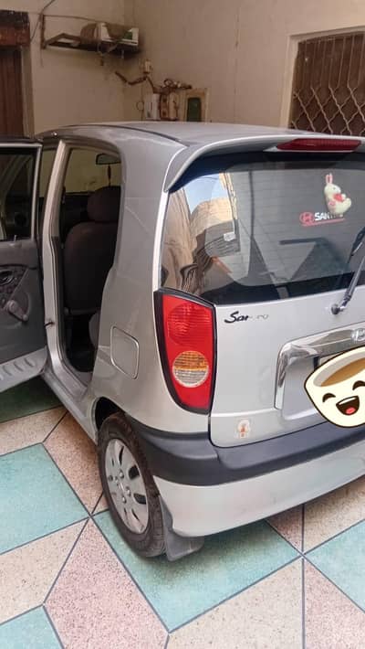 Total genuine + genuine 100 % santro exactive 2004