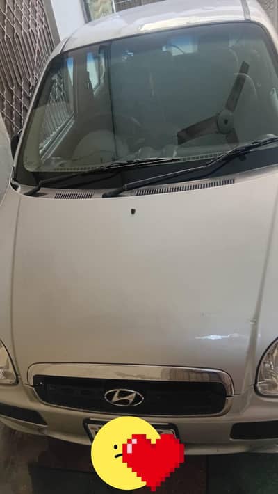 Total genuine + genuine 100 % santro exactive 2004